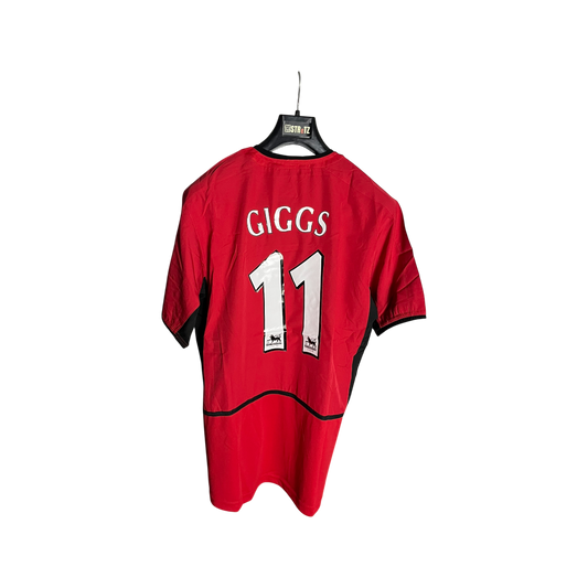 Red sports jersey with 'GIGGS' and number '11' on a white background