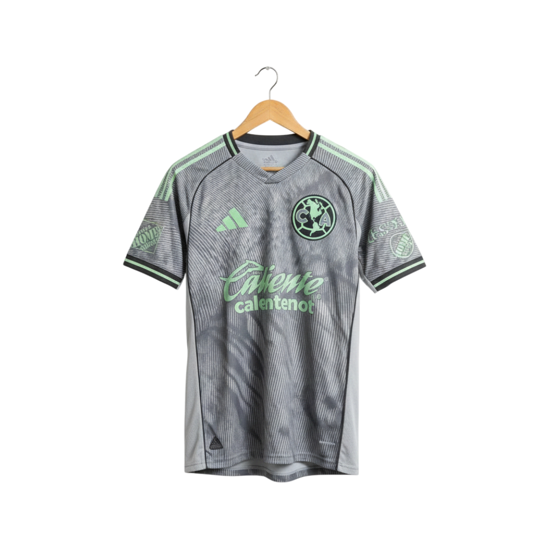 Gray sports jersey with green accents on a hanger against a white background