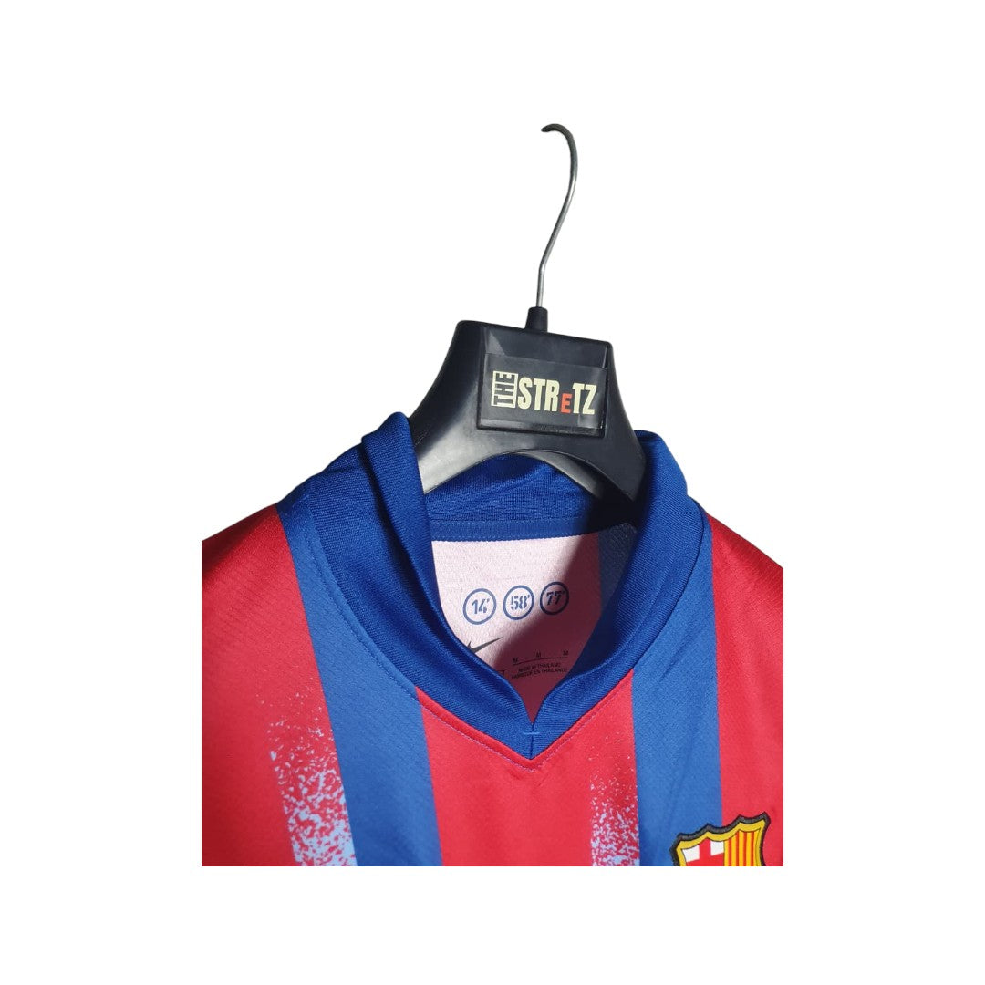 Red and blue sports jersey on a hanger with 'The Streetz' label.