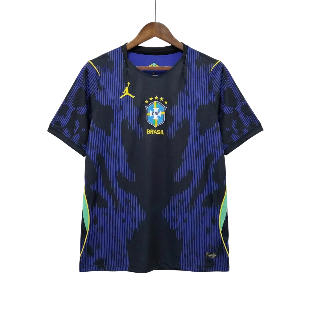 Blue and black sports jersey with a logo on a hanger against a white background