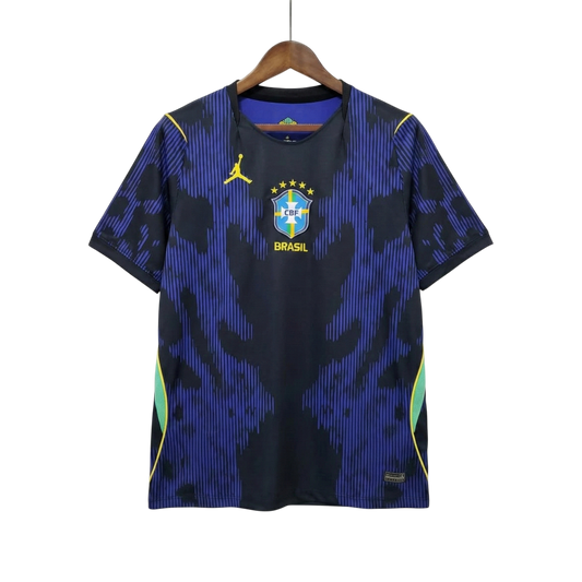 Blue and black sports jersey with a logo on a hanger against a white background