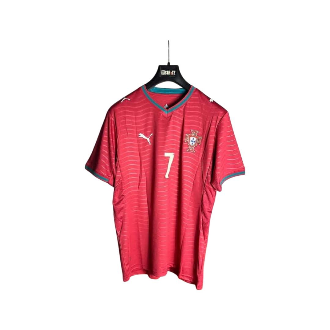 Red soccer jersey with number 7 on a hanger against a white background