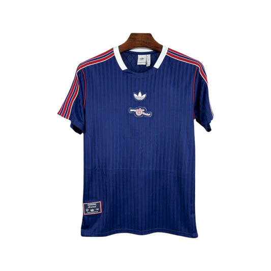 Blue sports jersey with red and white accents on a hanger against a white background
