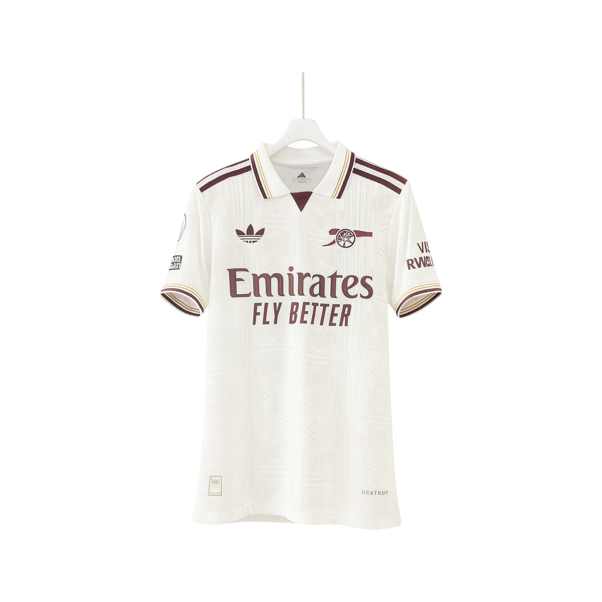 White sports jersey with Adidas logo and 'Emirates Fly Better' text on a white background