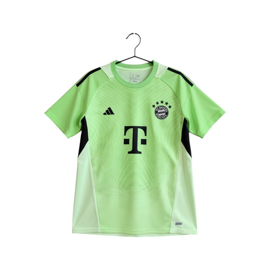 Green sports jersey with black accents on a hanger against a white background