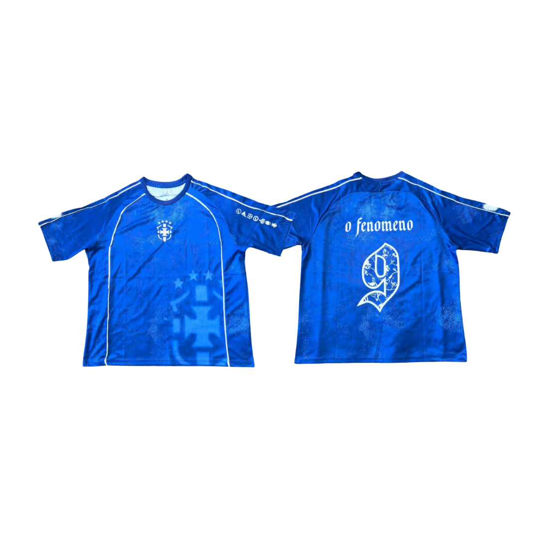 Two blue sports jerseys with logos on a white background