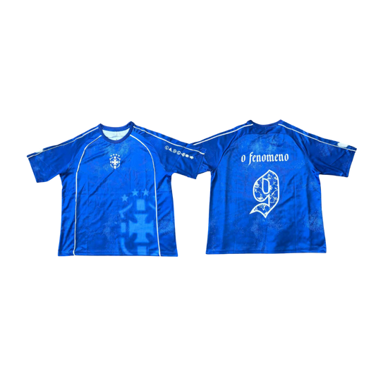 Two blue sports jerseys with logos on a white background