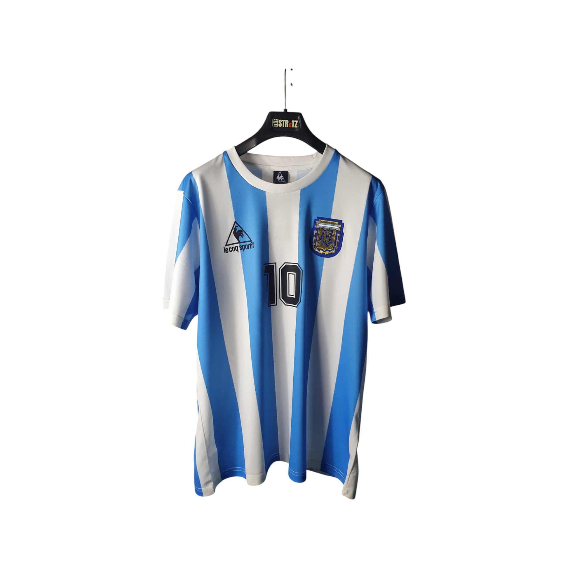 Argentina Home Blue and white striped sports jersey on a hanger with a visible brand logo.
