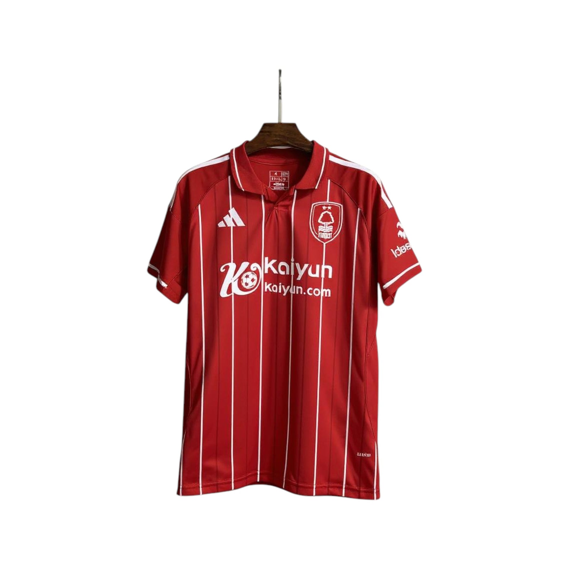 Red sports jersey with white stripes and branding on a hanger against a white background