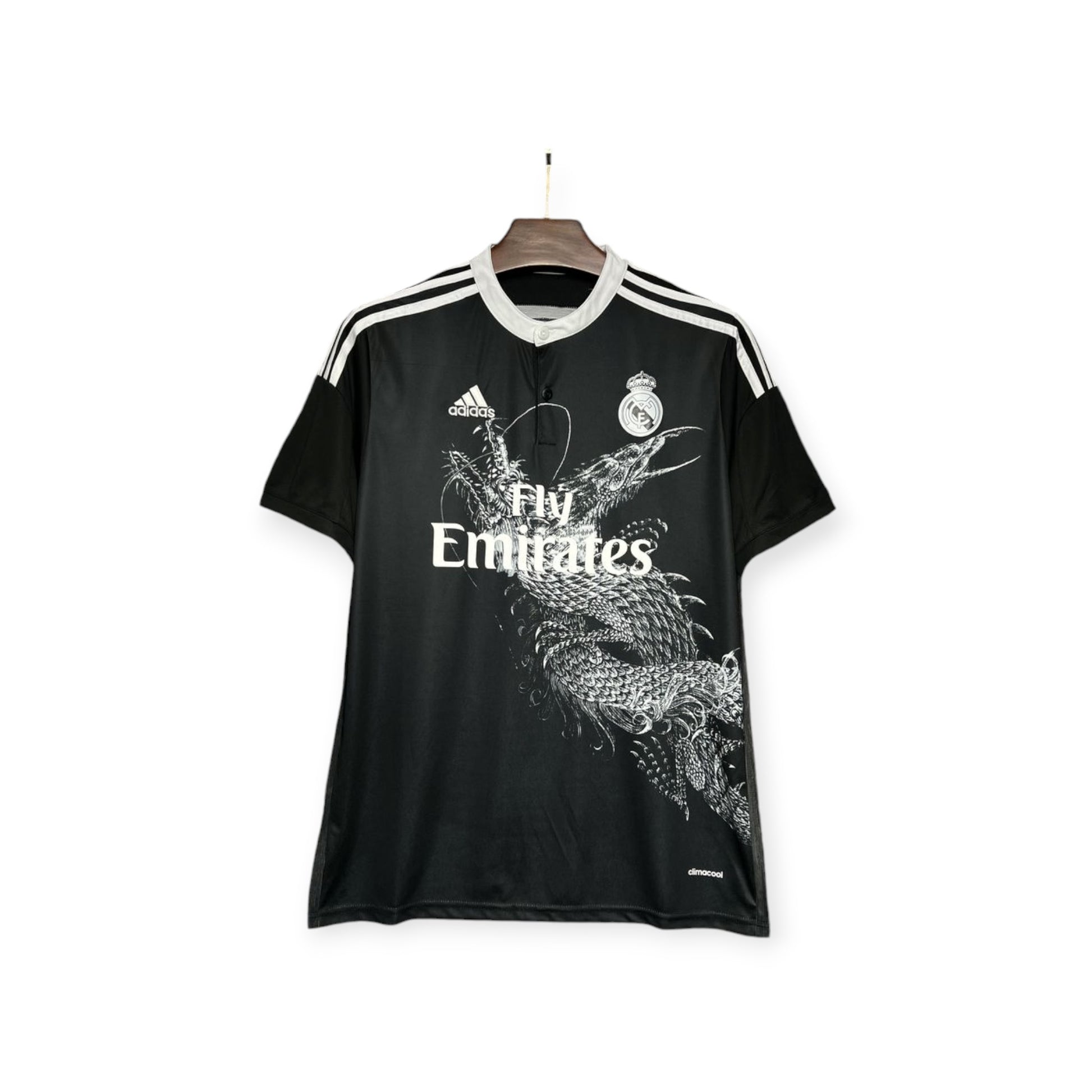 Real Madrid 2014/2015 Away Jersey displayed on a mannequin, featuring a black color scheme with white and grey accents and text.