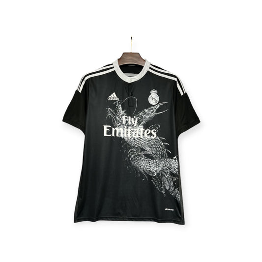 Real Madrid 2014/2015 Away Jersey displayed on a mannequin, featuring a black color scheme with white and grey accents and text.