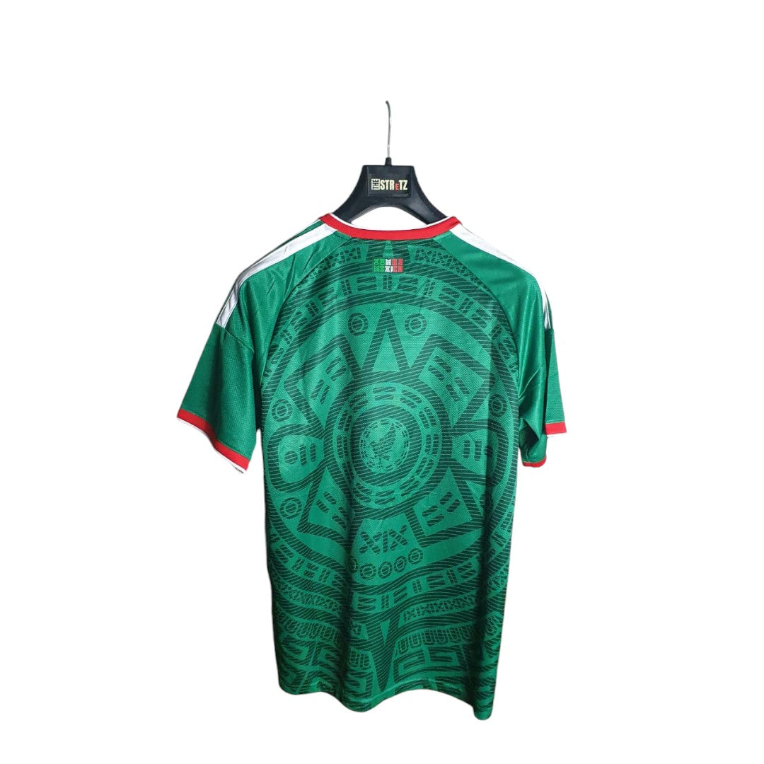 Green sports jersey with a circular design on a white background
